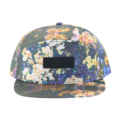 100% بوليستر 7 لوحة Snapback قبعة معسكر مخصصة مع شعار بقع جلدية على الجبهة
